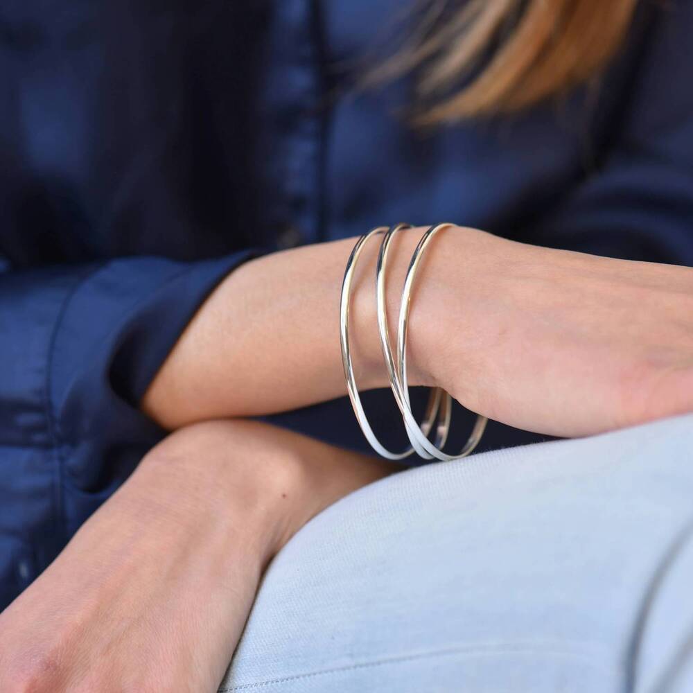 NEW BRITTA AMBAUEN JEWELRY women's wrap bangle bracelet in silver